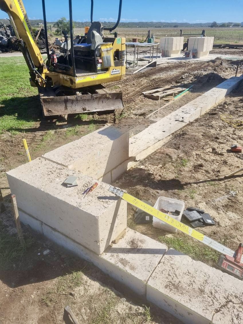 Concrete slab being poured with truck